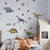 Dormitor de baiat amenajat cu stickere de perete cu dinozauri